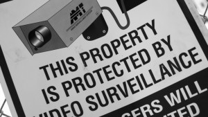 video surveillance, retail, warning sign