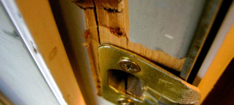 burglars - broken lock and door