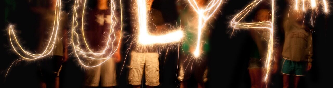 Young people are spelling out July 4th with sparklers
