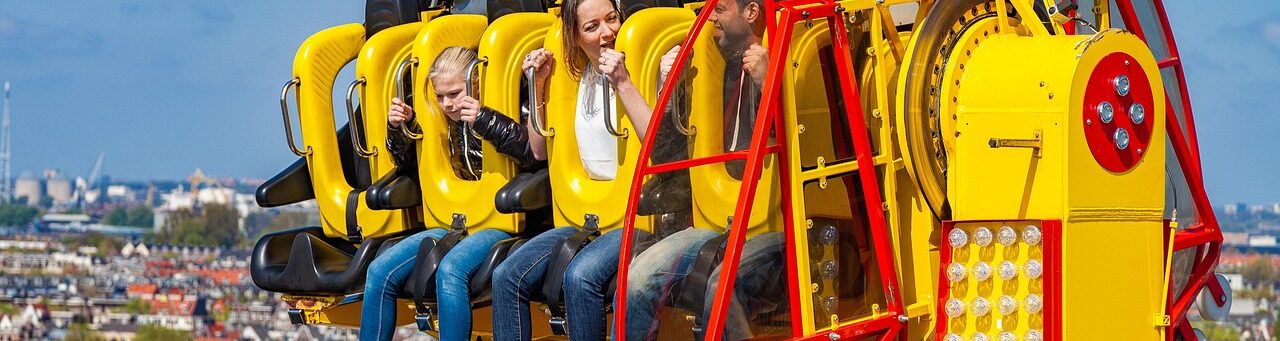A family on a ride at an amusement park