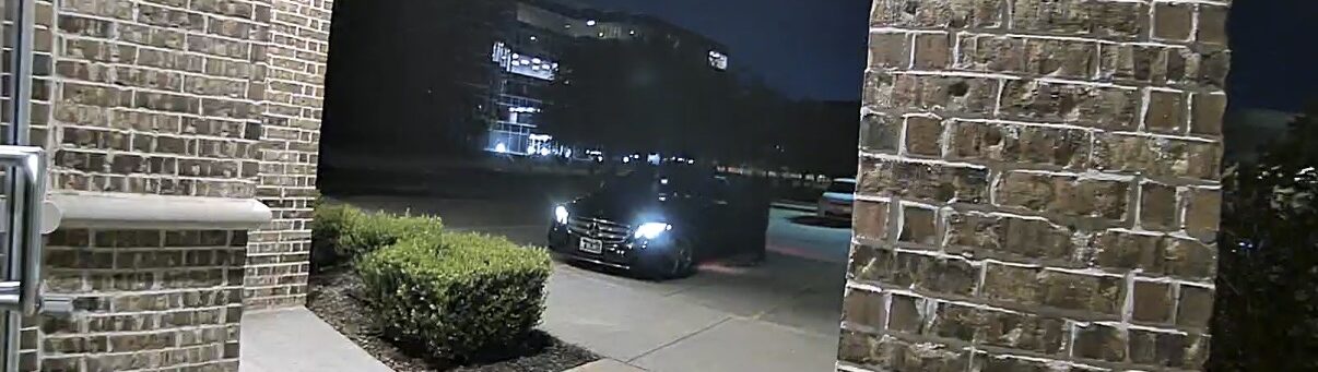 Outisde an office building at night