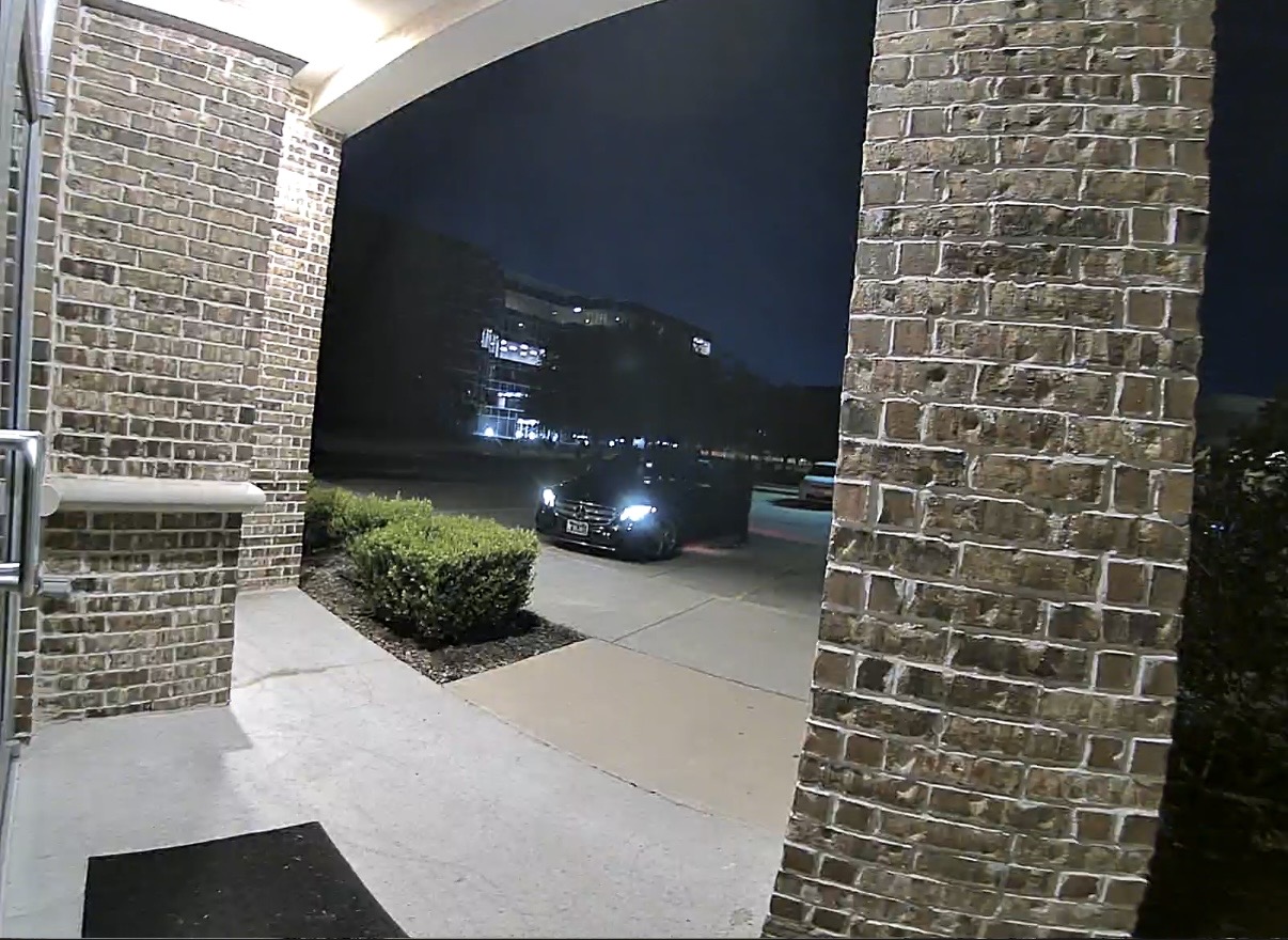 Outisde an office building at night