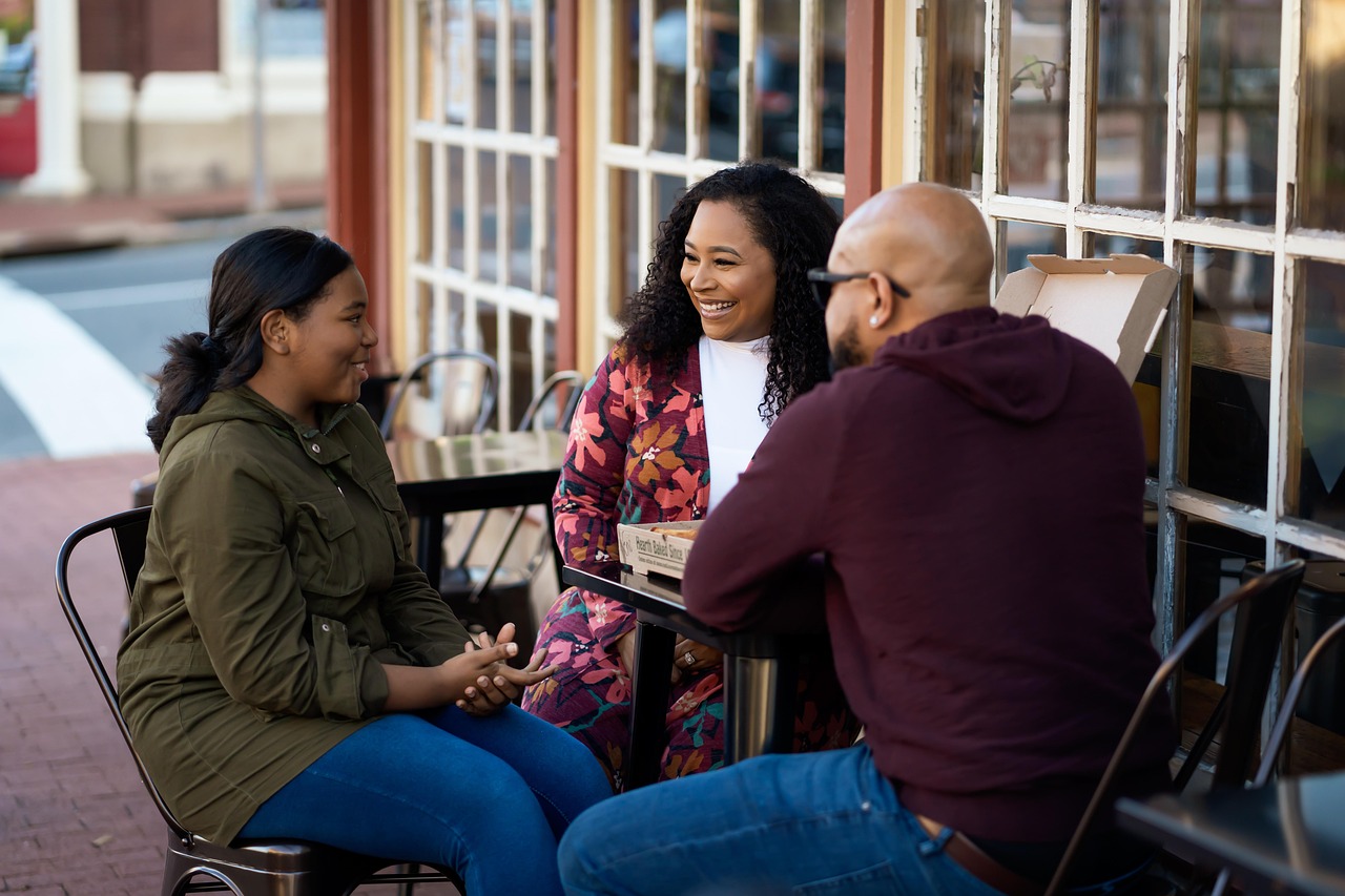 Parents talking to their daughter about staying safe