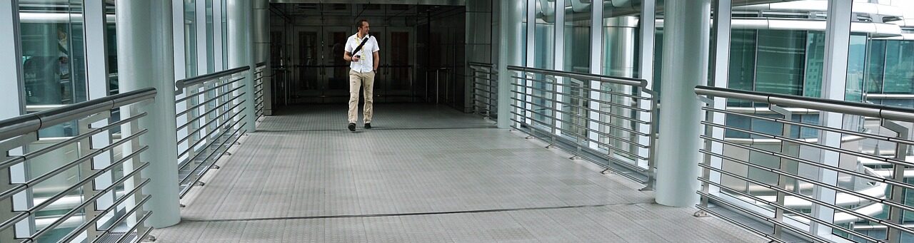 Man walking in office during business slowdown