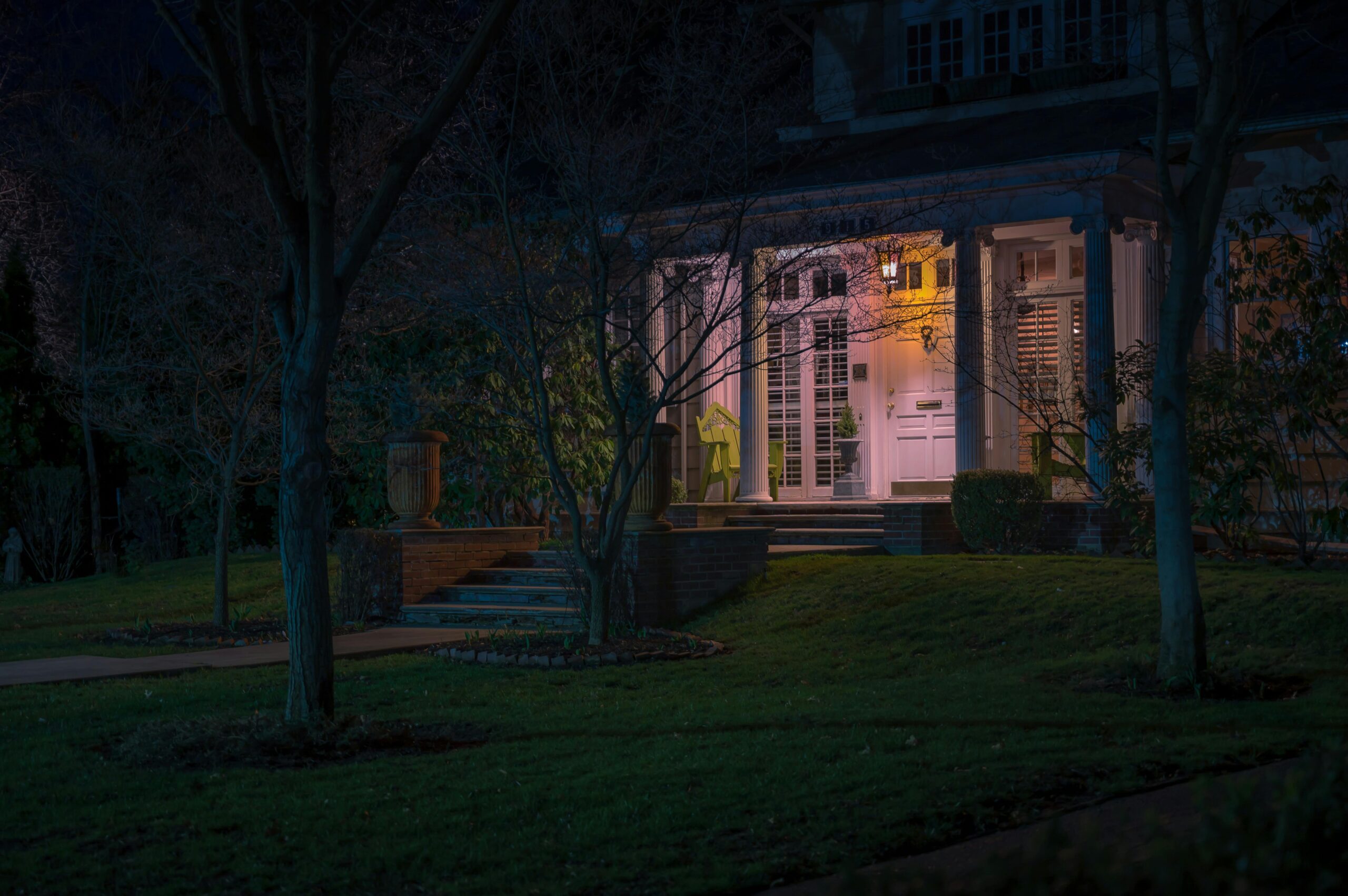 A well-lit suburban home at night - security lighting for home safety