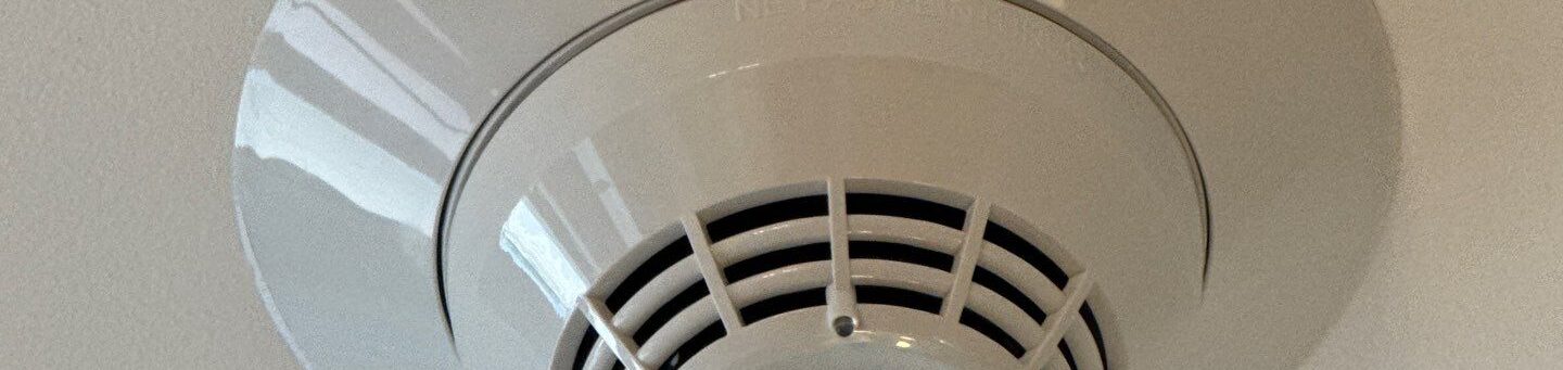 a smoke detector for a residential fire alarm